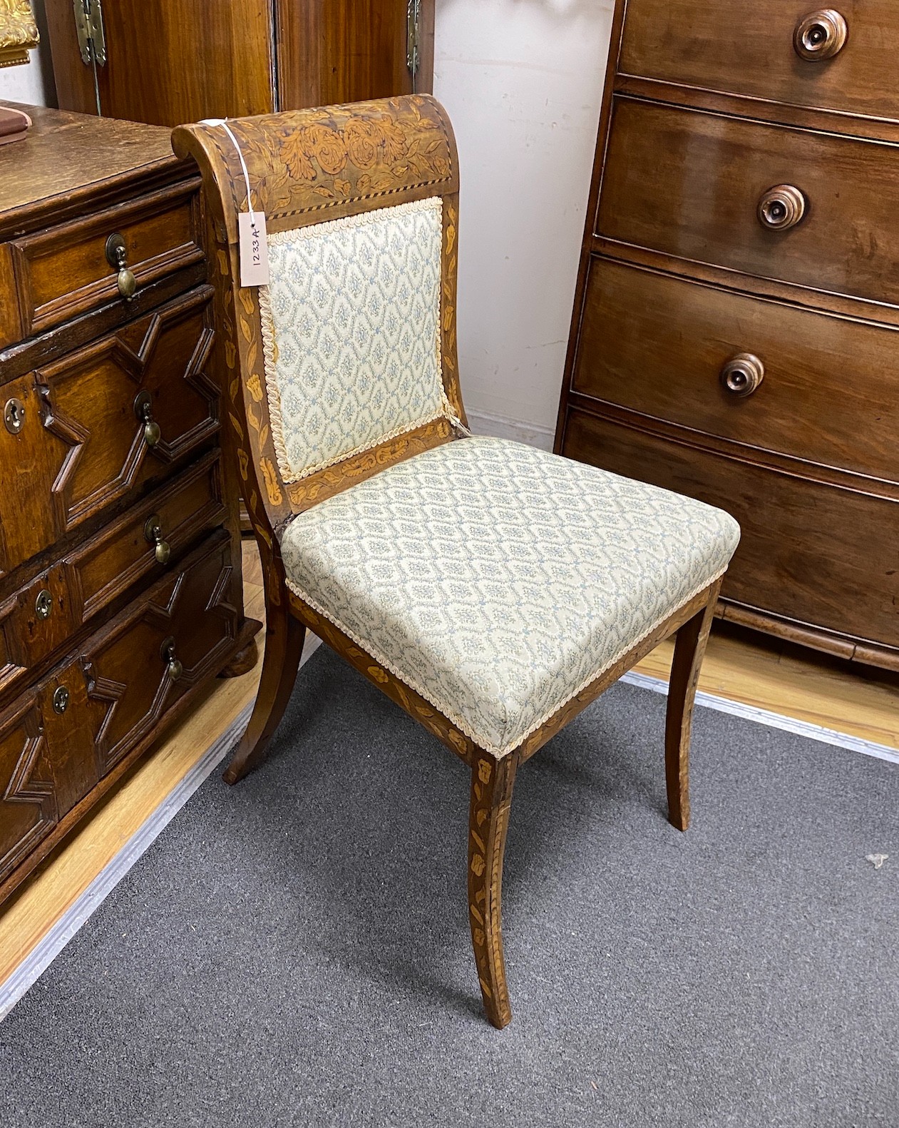 An early 19th century Dutch floral marquetry dining chair